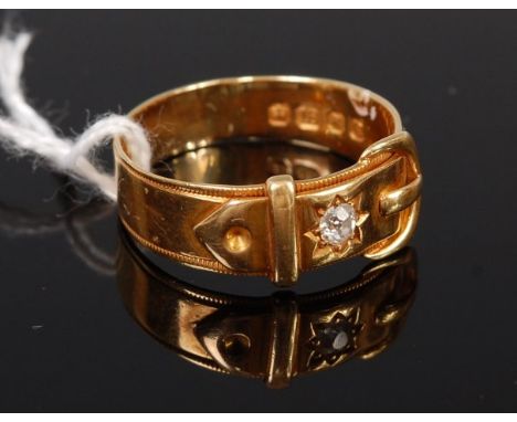 An 18ct gold and diamond belt ring, the gypsy set old cut diamond weighing approx. 0.12ct, 5.1g, size T