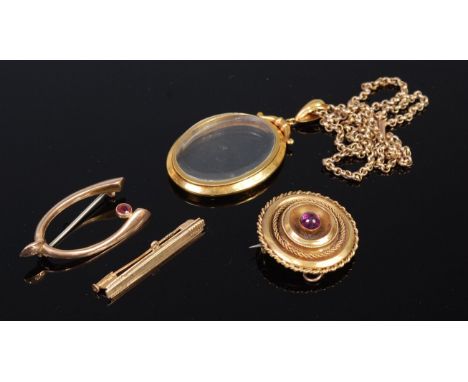 A 9ct gold ruby set wishbone brooch, together with an 18ct gold bar brooch, gilt metal  picture locket  on 9ct gold belcher n