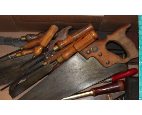 A collection of vintage woodworking tools, to include; eight assorted chisels, a Marples smoothing plane, an I.Sorby (Sheffie