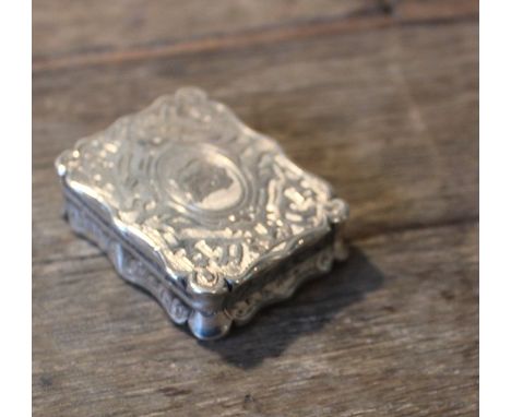 A Victorian silver rectangular vinaigrette, by Charles Washington Shirley Deakin, assayed Birmingham 1854, having engraved an