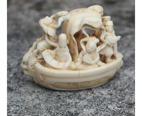 A fine Meiji period Japenese netsuke depicting the seven&nbsp; gods of good fortune, red deal mark to base