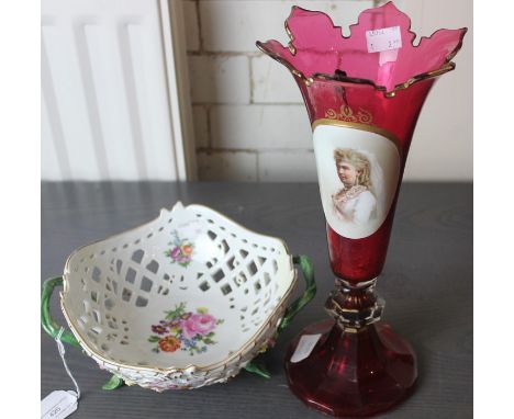 A late 19th century Bohemian ruby overlaid glass trumpet vase, with hand painted portrait oval, castellated rim and gilt high