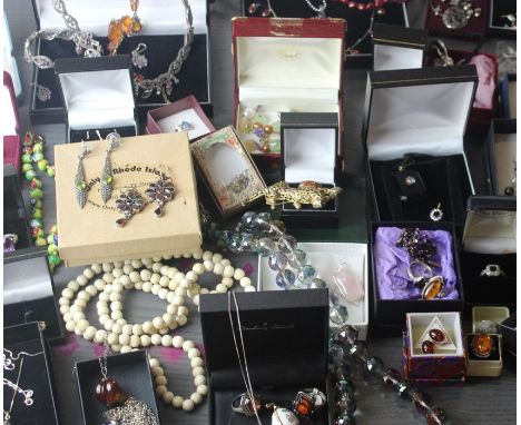 A good collection of costume jewellery, to include; a white metal, purple-pink stone and marcasite set pendant necklace, brac