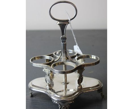 An early Victorian silver four bottle cruet stand, by John Evans II, assayed London 1838, with ribbed decoration and quatreoi