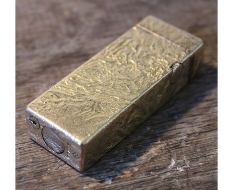 An Alfred Dunhill 9ct. gold Rollagas lighter, assayed London 1965, with textured finish, stamped Dunhill makers' mark to base