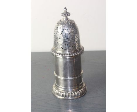 An Edwardian silver sugar caster, by assayed London 1903, having domed bayonet fitting pierced cover with engraved decoration