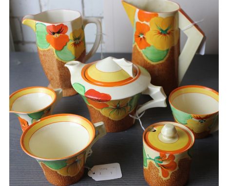 A collection of Clarice Cliff Bizzarre for Newport Pottery "Nasturtium" pattern tea service pieces, c.1930's, to include; Daf