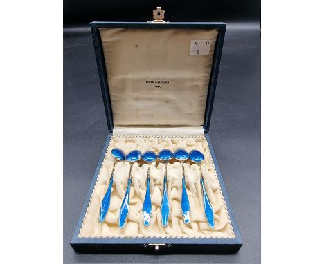 A cased set of six Norwegian silver gilt and blue guilloche enamel coffee spoons,&nbsp;the case inscribed 'David Anderson, Os