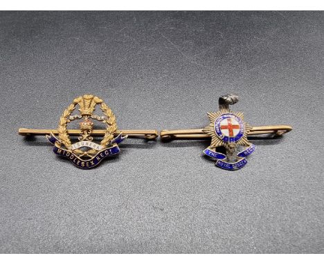 A 'Middlesex Regiment' yellow metal and enamel bar brooch, stamped '15ct', 5.4g gross, 4.9cm wide; together with another 'Roy