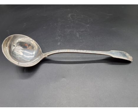 A George III silver fiddle thread and shell pattern soup ladle, by Eley, Fearn &amp; Chawner, London 1808, 33cm, 244g. 