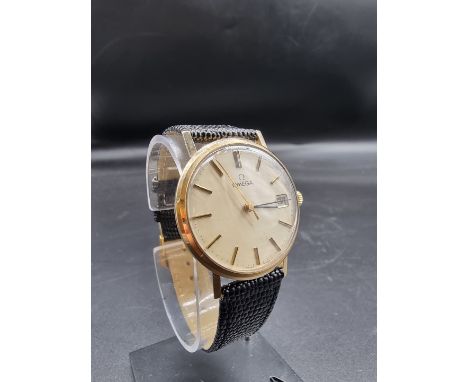 A circa 1979 Omega 9ct gold manual wind wristwatch,&nbsp;34mm, cal 1030, on replacement leather strap. 