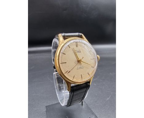 A vintage Smiths 'Astral' gold plated manual wind wristwatch,&nbsp;33mm, on black leather strap. 