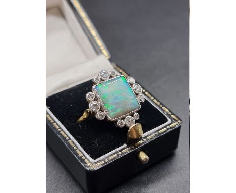 An 18ct gold opal and diamond cluster ring, Birmingham 1981, size O, gross weight 5.4g. 