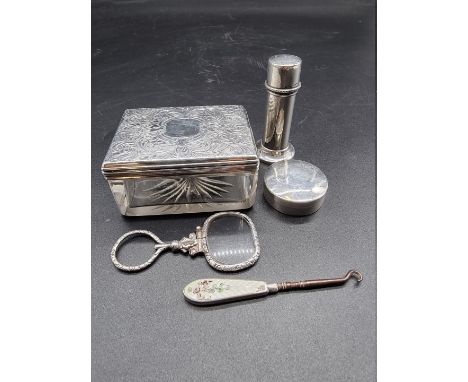 A Victorian silver lidded glass box, London 1857, 8cm wide; together with a silver pepperette; a silver circular box &amp; co