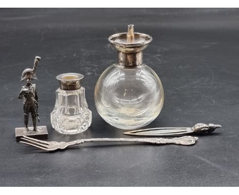 A modern silver model of a Napoleonic soldier, 7cm high; together with a silver mounted glass table lighter, inscribed 107th 