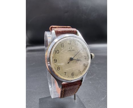 A vintage Omega stainless steel manual wind wristwatch,&nbsp;36mm, on brown leather strap, (case and movement/dial possibly a