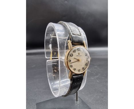 A circa 1971 Omega 9ct gold ladies manual wind wristwatch, 19mm, cal 620, on leather strap. 
