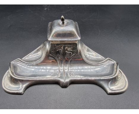 A silver inkwell, by Joseph Gloster Ltd., Birmingham 1923, 19cm wide.