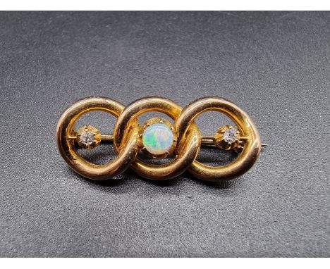 A yellow metal brooch, formed as three entwined hoops, set cabochon opal and two diamonds, 35mm. 