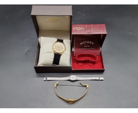 A boxed Rotary 1895 gold plated quartz wristwatch, 35mm; together with two ladies wristwatches. 