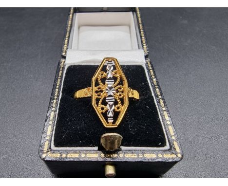 A yellow metal two tone ring, stamped 916, size R. 