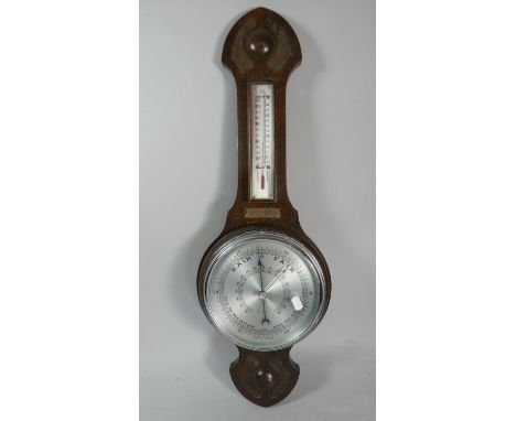 An Art Nouveau Onion Topped Oak Wall Barometer with Temperature Scale, 74cm High 