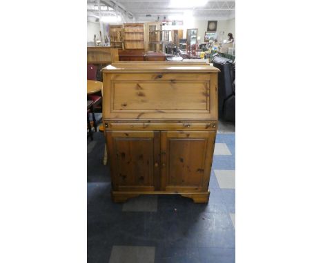 A Ducal Pine Fall Front Bureau with Fitted Interior and Cupboard Base, 87cm 