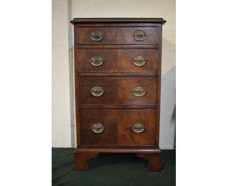 An Edwardian Walnut Chest of Four Graduated Drawers on Bracket Feet, 55.5cm Wide 