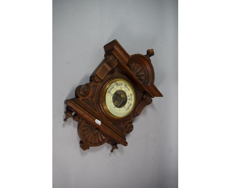 A Late 19th Century Carved Oak Aneroid Wall Barometer, 47cm High 