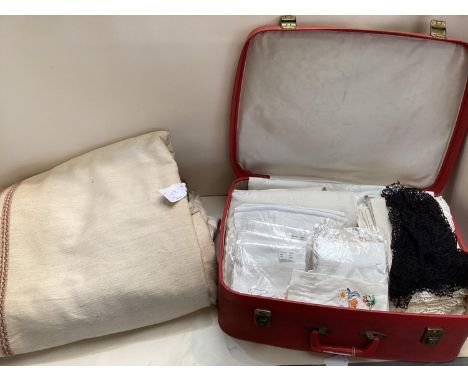 Suitcase full of vintage linen, and a bed cover 