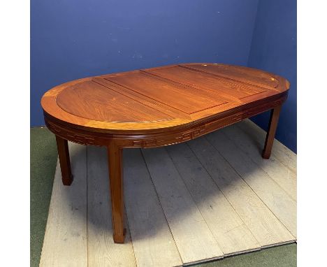 Circular modern light coloured dinning table in the Oriental taste, which closes down to a circular table,  203cmL x 112cm wi