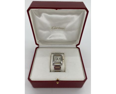 A Cartier stainless steel and yellow metal Gentleman's Tank Americano wrist watch, rectangular face with Roman numeral marker