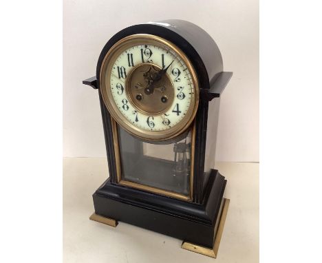 A French, black slate domed top mantel clock, with circular brass dial , (crack to enamel face), 39cm H x 27 x 17 