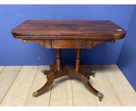 A Georgian flame mahogany/rosewood fold over card table 