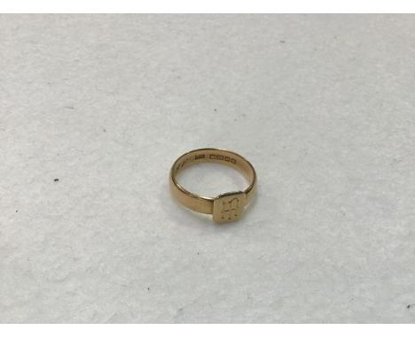 An 18ct gold signet style ring with engraved cypher HI, dated 6.6.1935 (5.59g)