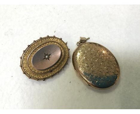 A 9ct gold oval engraved locket with 1920s wedding photographs, stamped verso (l.4cm x 3cm) and a Victorian yellow metal step