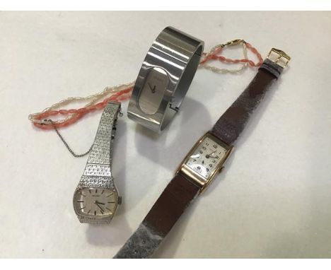 A Longines gentleman's tank shaped yellow metal wristwatch with enamel dial, subsidiaries dial and arabic numerals, on leathe