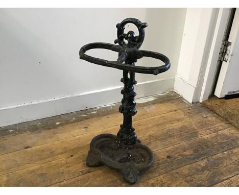 A Victorian style cast iron two division stick stand with painted green finish (h. 53cm x 28cm x 19cm)