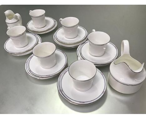 A Royal Doulton Simplicity pattern twenty one piece tea service with floral grey and silvered border, complete with two milk 