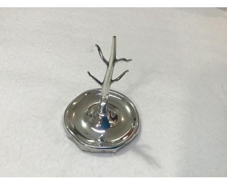 An Edwardian Birmingham silver ring stand of tapered form with four branches, on circular base (base (a/f)) (h.9cm x 6cm)