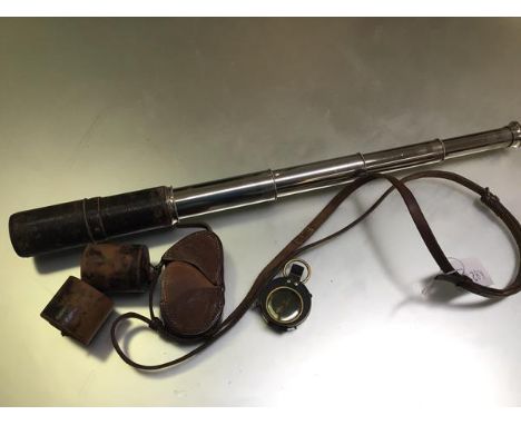 A WWI truncheon, a Cruchon &amp; Emons of London, 1915, compass complete with original leather carry case, and matching four 