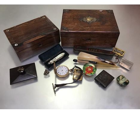 A mixed lot comprising a rosewood mother of pearl inlaid box, an Edwardian oak brass mounted box, a razor tin, a shoe horn, a