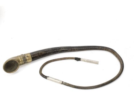 A Boa Constrictor elbow trumpet horn,patented 1907, brass with gauze, with remains of black paint to coil, mounting bracket r