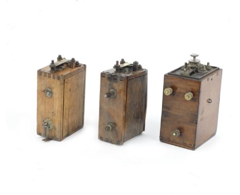 Three trembler coils,each wooden cased including one marked Ford to suit Model-T, the largest 7 x 10.5 x 18cm.  (3)For furthe