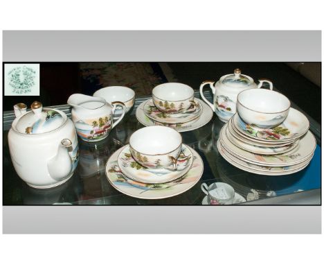 Oriental Part Japanese Teaset (19 ) pieces in total. Comprising teapot, cups and saucers, sugar bowl etc