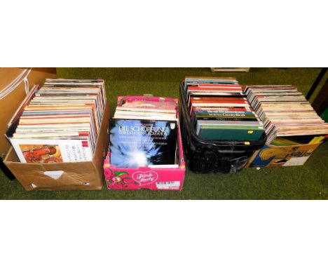 Four boxes of long playing records. 