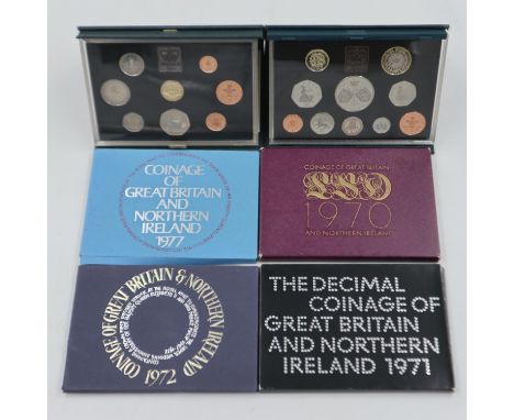 Deluxe proof UK coin sets, 1984 and 1997, and four further coin sets. UK P&amp;P Group 1 (£16+VAT for the first lot and £2+VA
