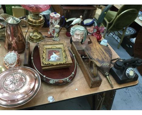 Large group of various items to include silver plated entree dishes, oil lamp, character jugs, telephone and other items.