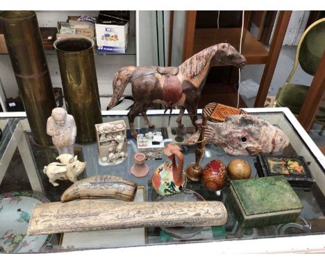 Sundry items, including a leather model of a horse, resin scrimshaws, terracotta fish, brass shells, etc