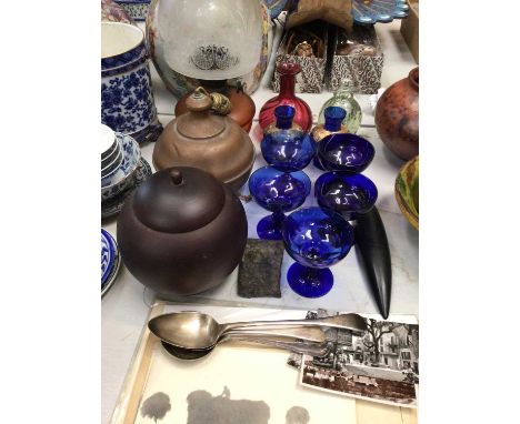 Glass oil lamp, copper lamp, five blue glasses, cranberry glass vase, three silver plated serving spoons, old photographs and